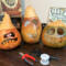 Three monster gourds sit with their gourd top waiting for their hats to be made
